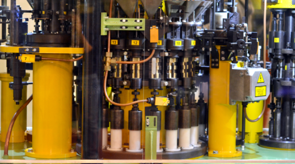A bullet casing machine, showing the complexity of the machinery involved.