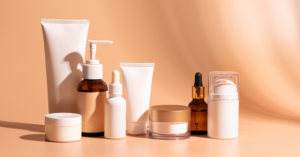 Unbranded cosmetic products displayed on an orange background